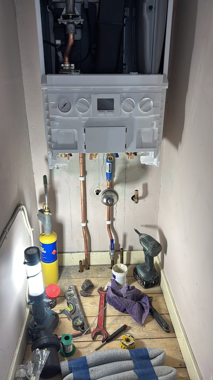 Back plate mounted and copper pipework run during the install